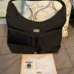 GUCCI PURSE AUTHENTICATED THROUGH ENRUPTY